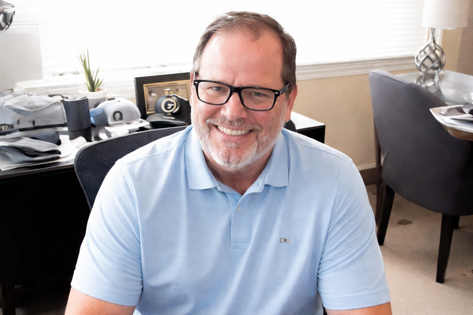 Home builder owner at his desk
